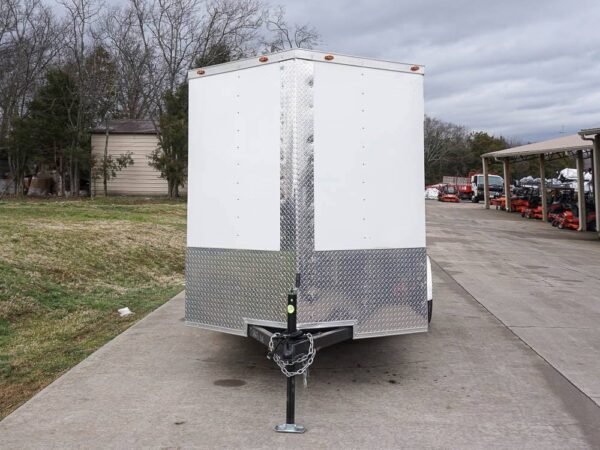 6' x 12' white enclosed v nose trailer with diamond plate floor storage