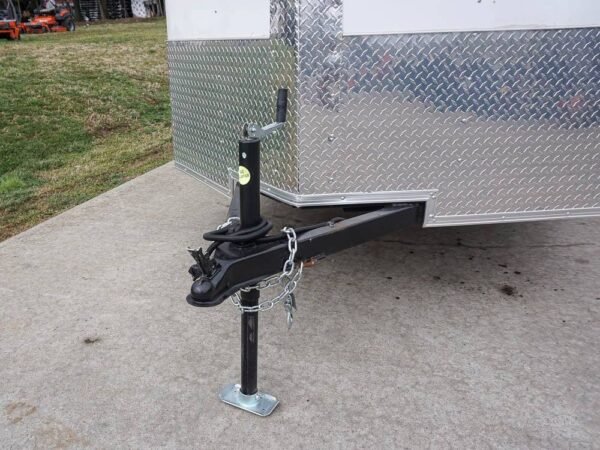 6' x 12' white enclosed v nose trailer with diamond plate floor storage