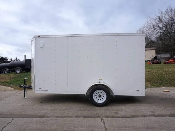 6' x 12' white enclosed v nose trailer with diamond plate floor storage