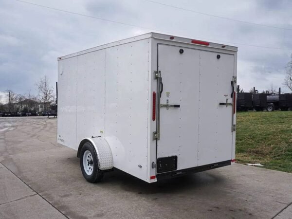 6' x 12' white enclosed v nose trailer with diamond plate floor storage