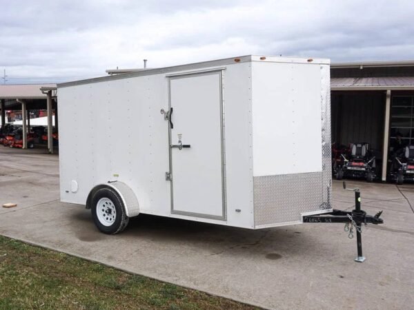 6' x 12' white enclosed v nose trailer with diamond plate floor storage