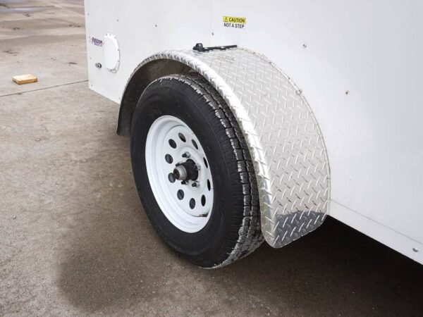 6' x 12' white enclosed v nose trailer with diamond plate floor storage
