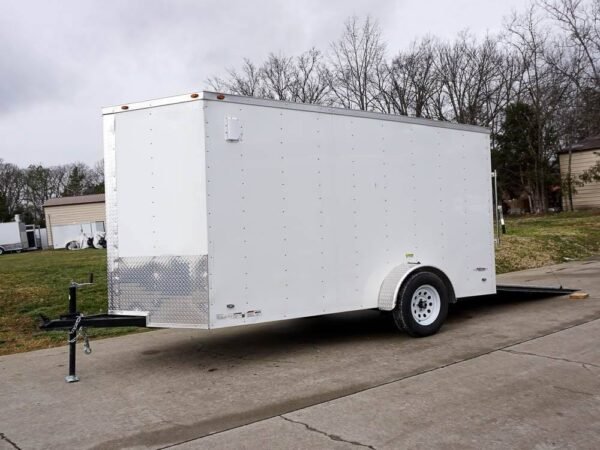 6' x 12' white enclosed v nose trailer with diamond plate floor storage