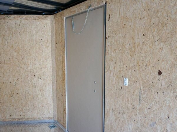 6' x 12' white enclosed v nose trailer with diamond plate floor storage